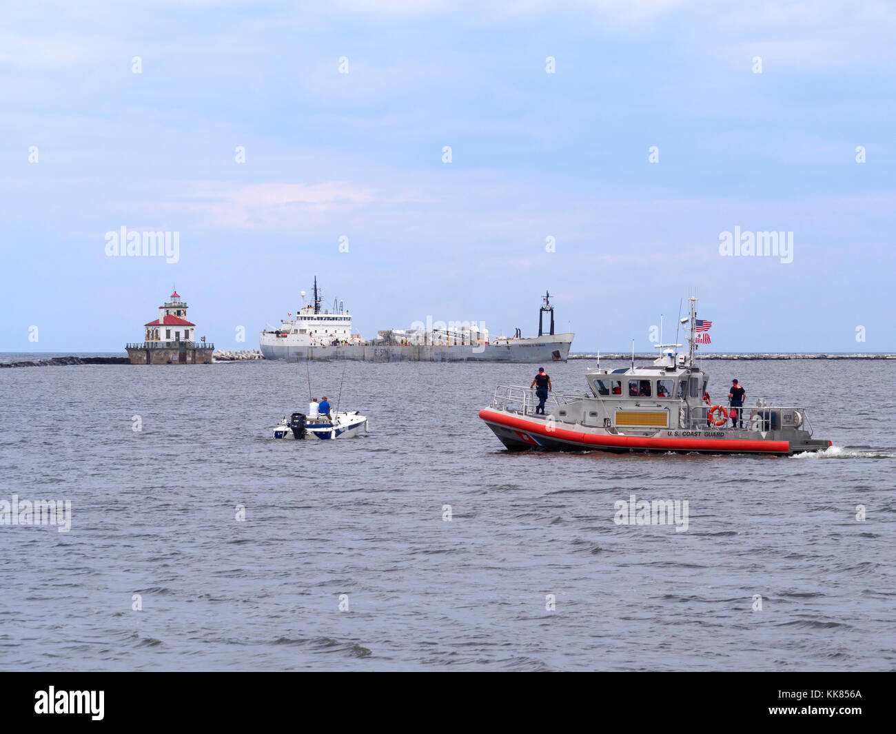 US Coast Guard stopping boats for inspection in Oswego Harbor Stock Photo