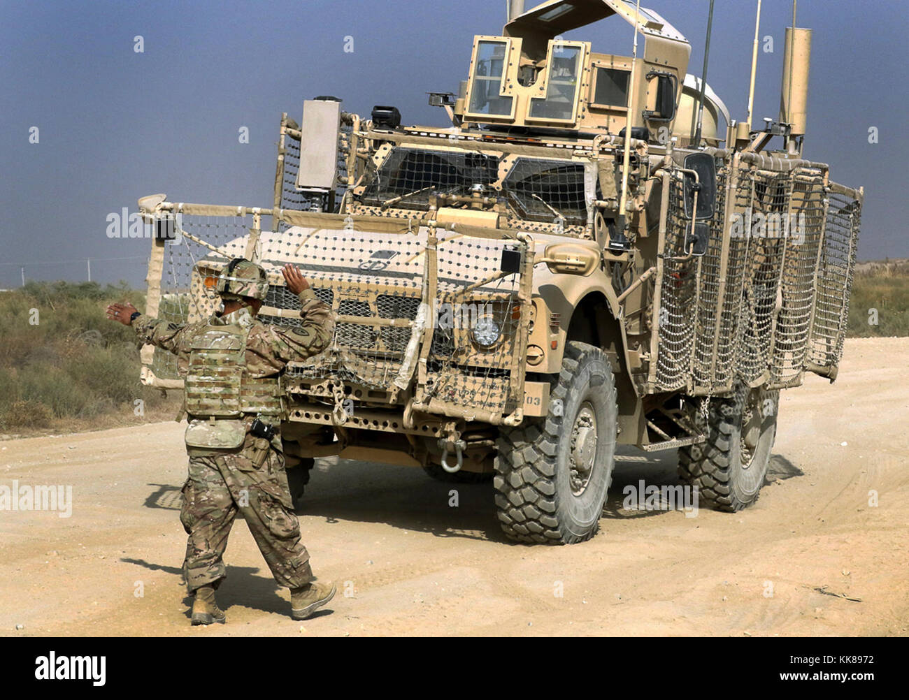 BAGRAM AIRFIELD, Afghanistan - Staff Sgt. Arturo Amaro, the master driver for the 3rd Special Troops Battalion, 3rd Infantry Division Resolute Support Sustainment Brigade, backs up a Oshkosh Defense mine-resistant, ambush-protected vehicle All-Terrain Vehicle (MAT-V) before the off-road portion of the master driver training course Nov. 8 at Bagram Airfield, Afghanistan. Amaro and a group from the 82nd Airborne Division conducted a two-week training course over a MAT-V, a MaxxPro II MRAP, and mine rollers to certify them to teach drivers in any of these three platforms. (U.S. Army photo by Spc. Stock Photo