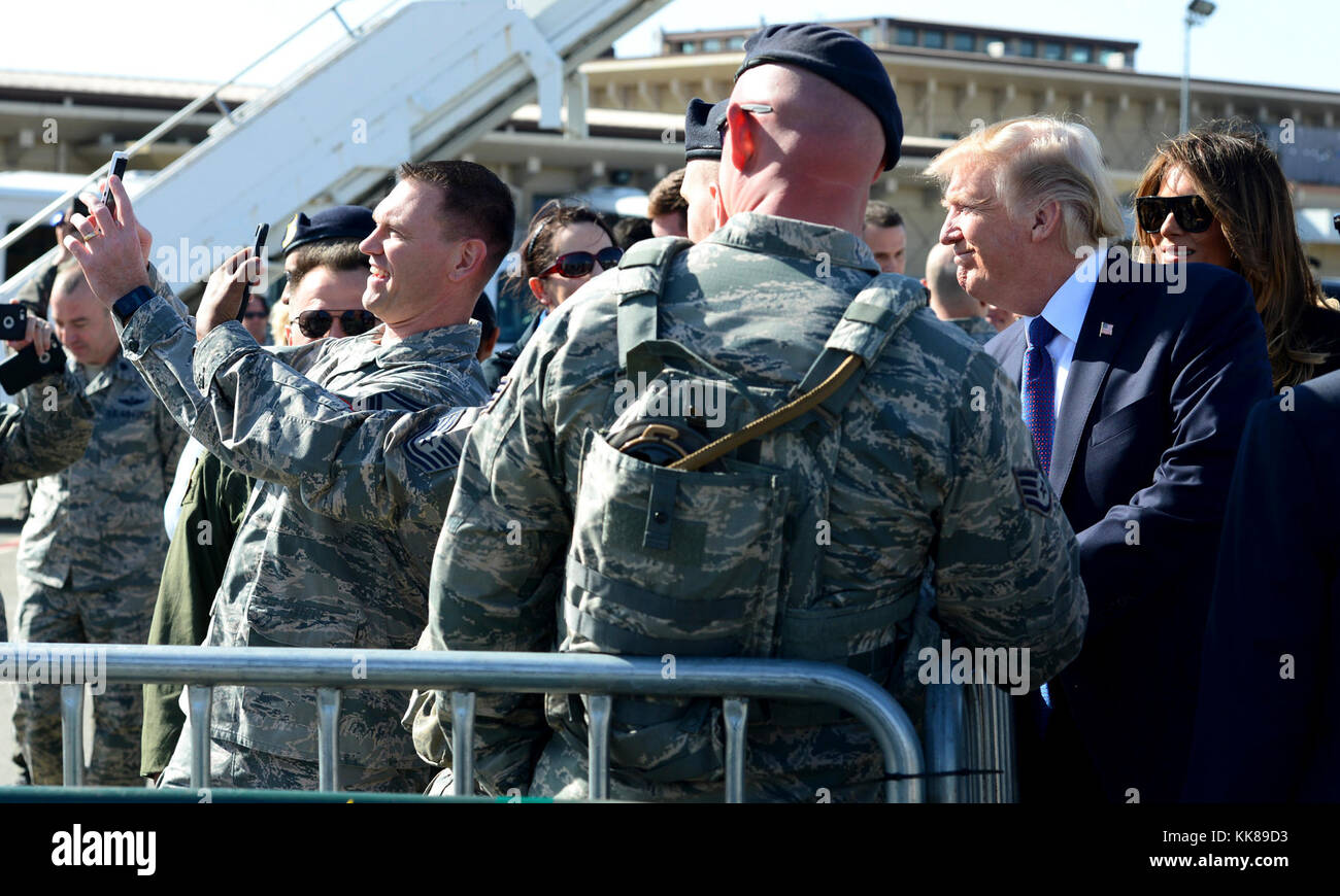 President Donald J. Trump speaks with Airmen from at Osan Air Base, Republic of Korea, Nov. 8, 2017. During his 13-day trip through the Pacific Theater, President Trump spoke with key military leaders of the region on strengthening the international resolve to confront the North Korean threat and ensure the denuclearization of the Korean Peninsula. (U.S. Air Force photo by Staff Sgt. Alex Echols III/Released) Stock Photo