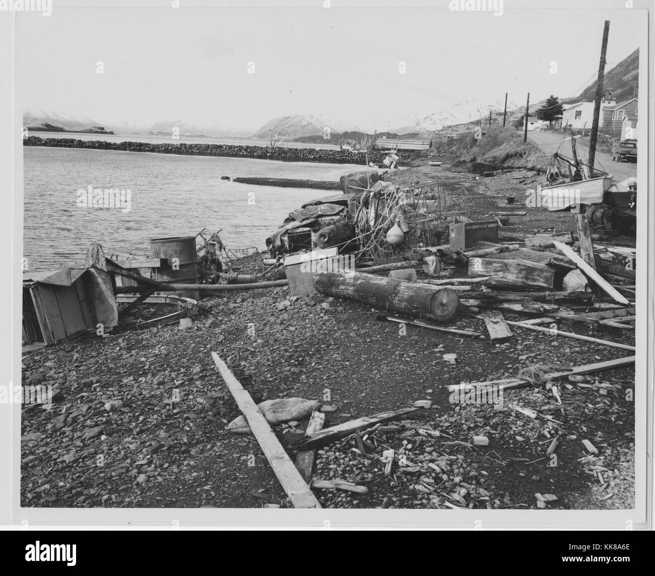 A photograph of debris left along the water after the 1964 Alaska earthquake, the debris was deposited after the water from the tsunami caused by the earthquake receded, the 92 magnitude earthquake originated in Prince William Sound and is the second largest earthquake ever recorded, Alaska, 1964. Stock Photo