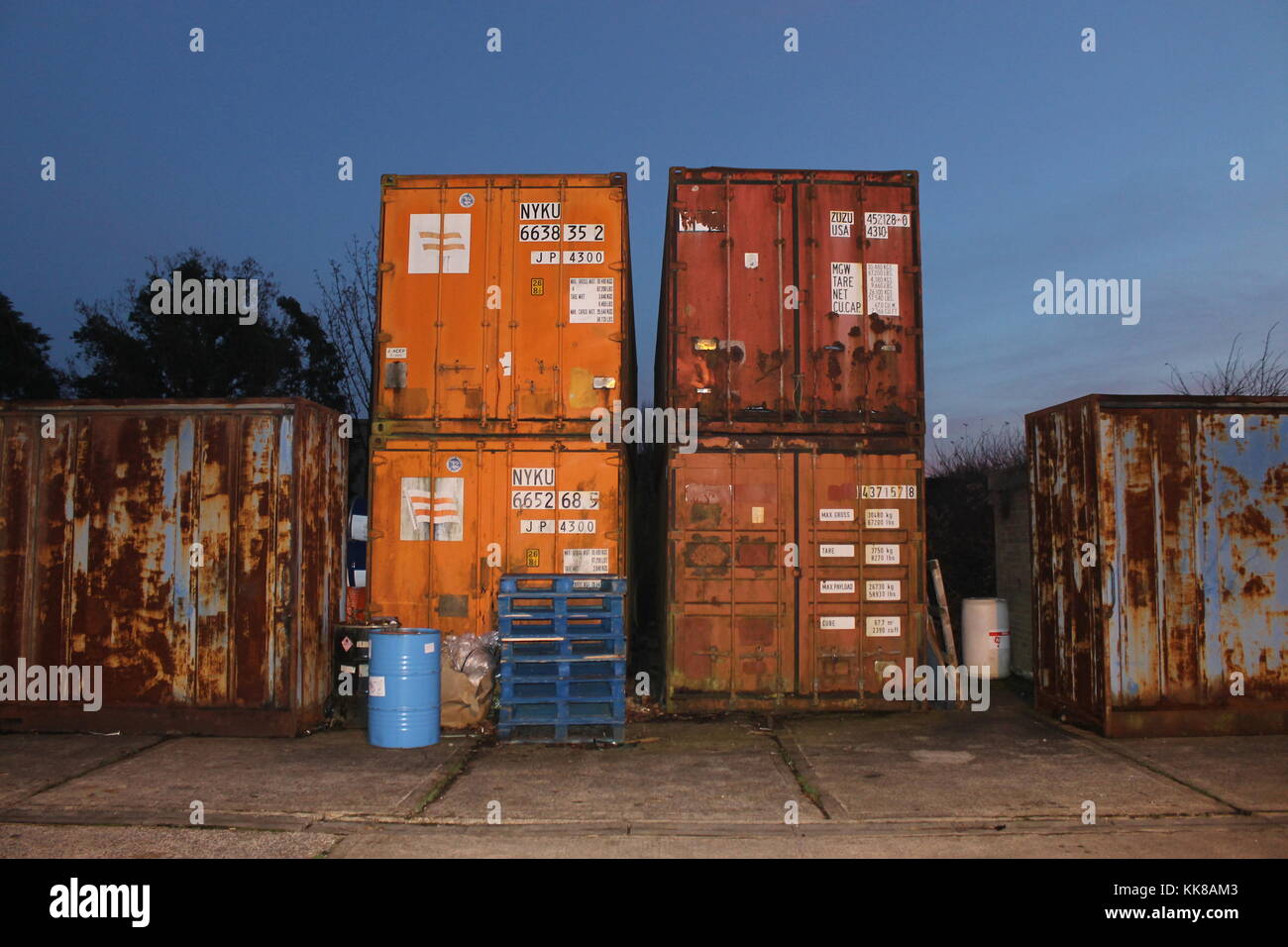 Rusty Industrial Containers With Detailed Texture. Stock Photo