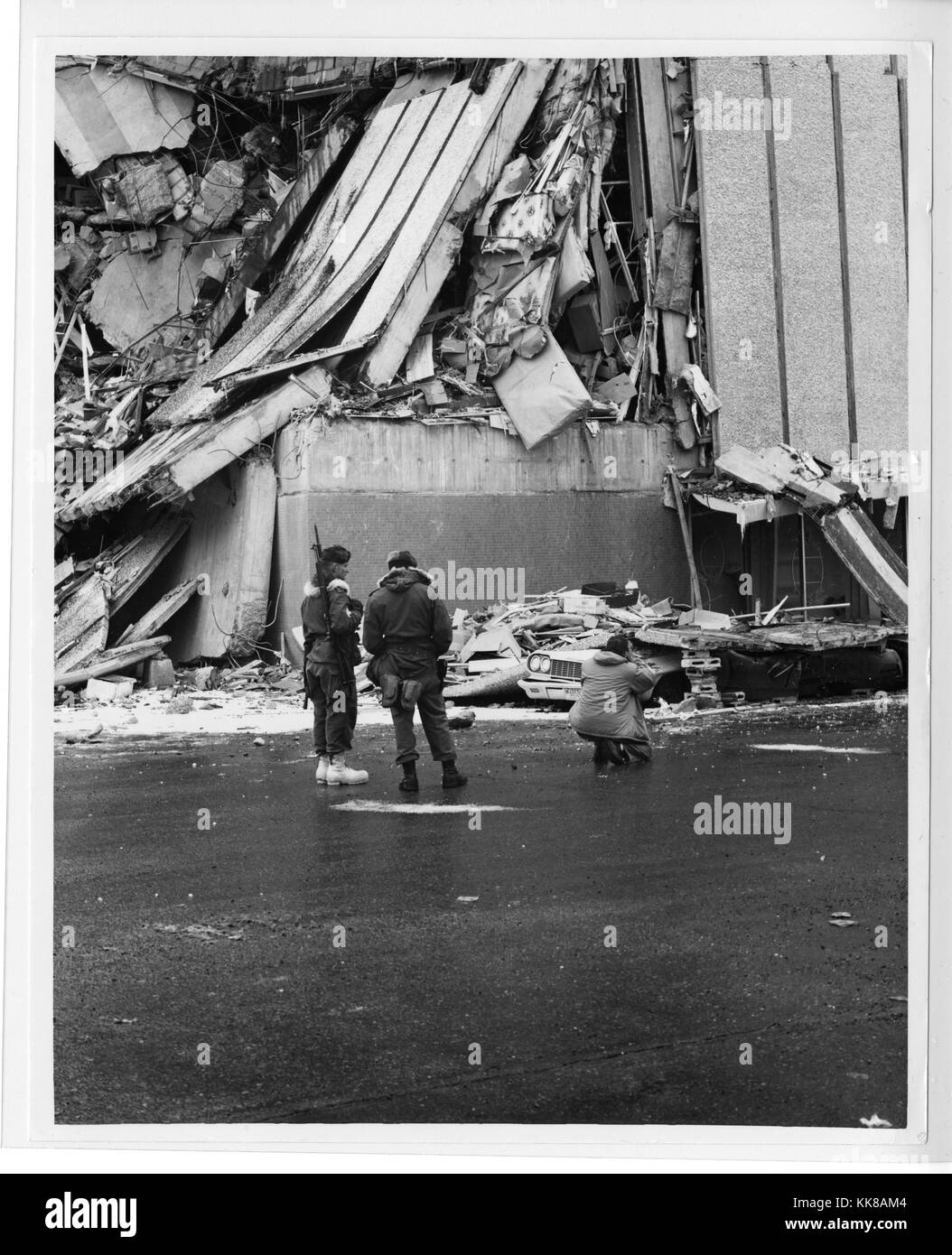 Damage to JC Penny's store and other miscellaneous stores in downtown Anchorage, from collection of Alaska Earthquake Photographs, courtesy Department of Defense, Alaska, 1964. Stock Photo