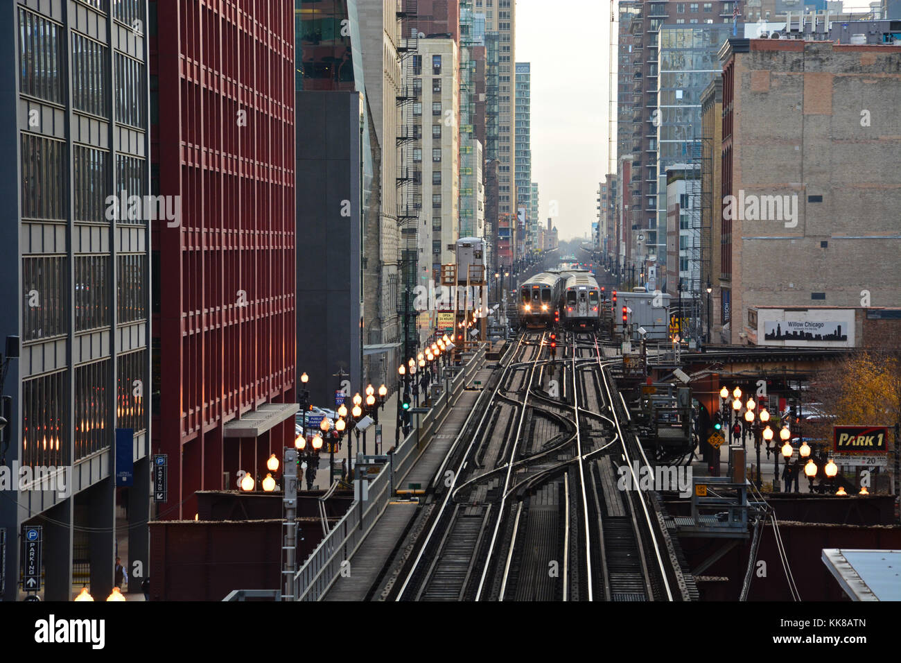 Trains pass on the elevated tracks over Wabash Avenue in Chicago's downtown Loop. Stock Photo