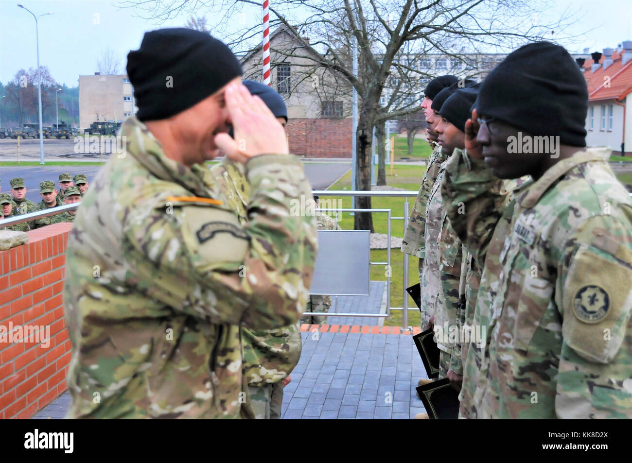 Lt. Col. Scott Cheney, the Battle Group Poland commander, awards ...