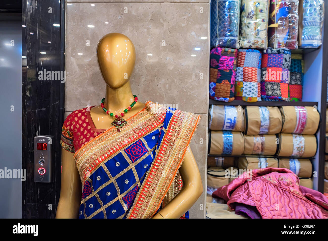 Back view mannequin wearing red sari Stock Photo - Alamy