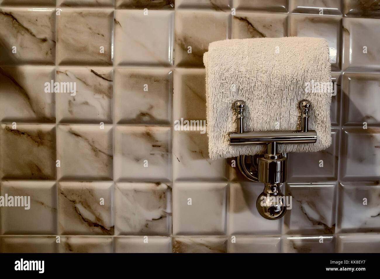 Towels on the shelf in bathroom Stock Photo - Alamy