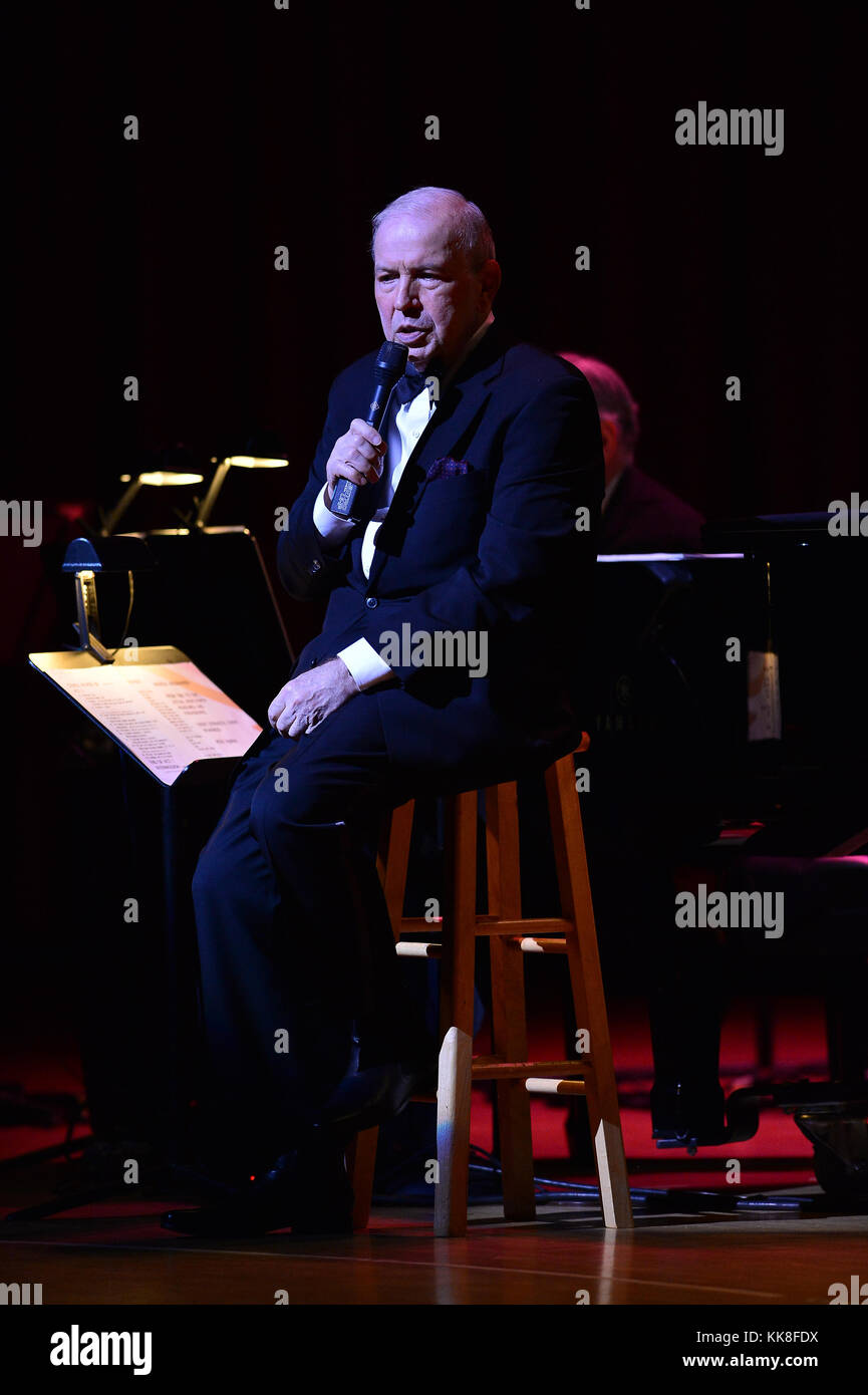 COCONUT CREEK, FL - JULY 12: Singer Frank Sinatra, Jr performs at Seminole Casino Coconut Creek. Franklin Wayne Sinatra (born January 10, 1944),  professionally known as Frank Sinatra, Jr., is an American singer, songwriter and conductor. Frank Jr. is the son of legendary musician and actor Frank Sinatra (born 'Francis') and Nancy Barbato Sinatra, his first wife. He is the younger brother of singer and actress Nancy Sinatra, and the older brother of television producer Tina Sinatra. In 1963, at the age of 19, Sinatra was kidnapped and released two days later after payment of a ransom on July 1 Stock Photo