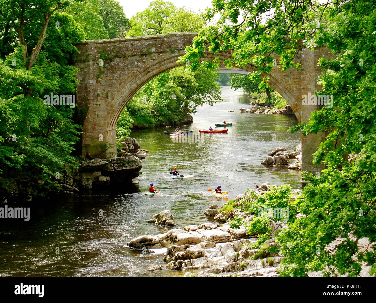 The Devils Bridge over the River Lune at the town of Kirkby Lonsdale, Cumbria. Canoeing, kayaking. England. Stock Photo