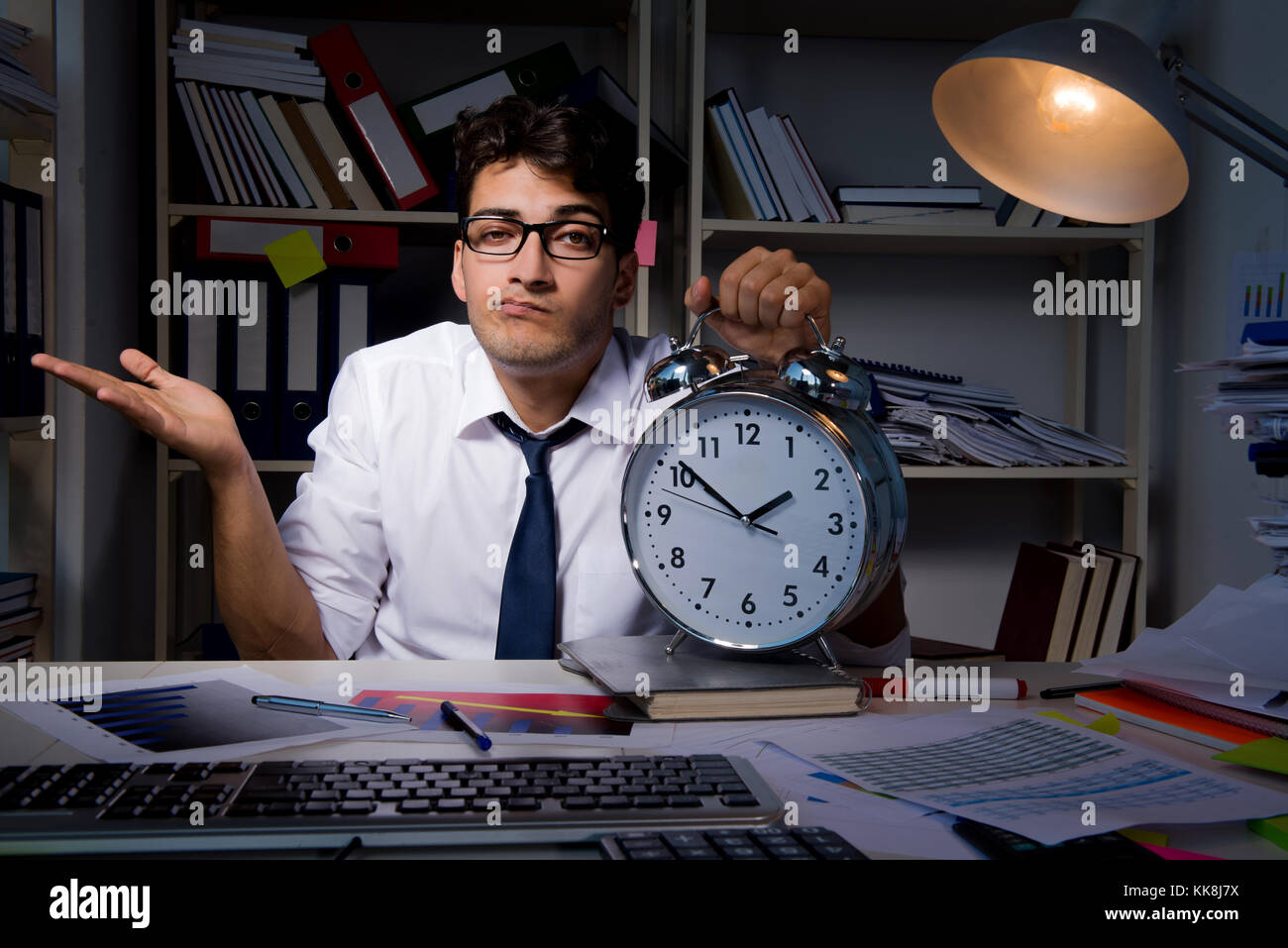 Man businessman working late hours in the office Stock Photo Alamy