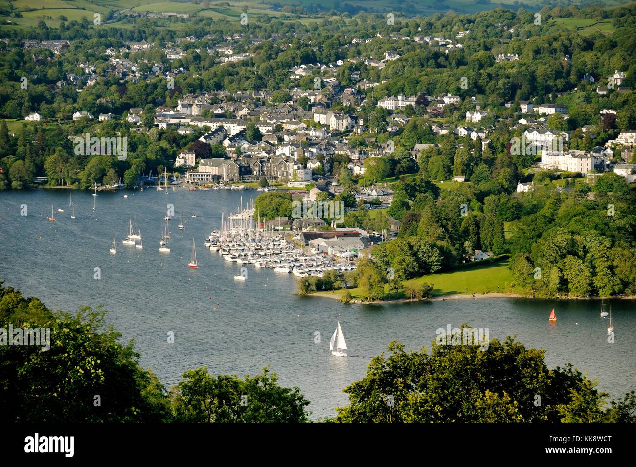 Windermere. Lake District National Park, Cumbria, England. N.E. over Bowness on Windermere boat moorings from above Far Sawrey Stock Photo