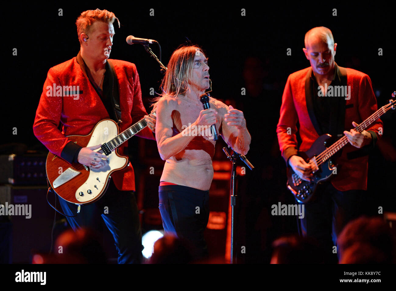 MIAMI BEACH, FL - APRIL 19: Iggy Pop is joined onstage by Eagles of Death  Metal (Paris Bombing) guitar player Josh Homme at the Fillmore Miami Beach  two days before his 69th