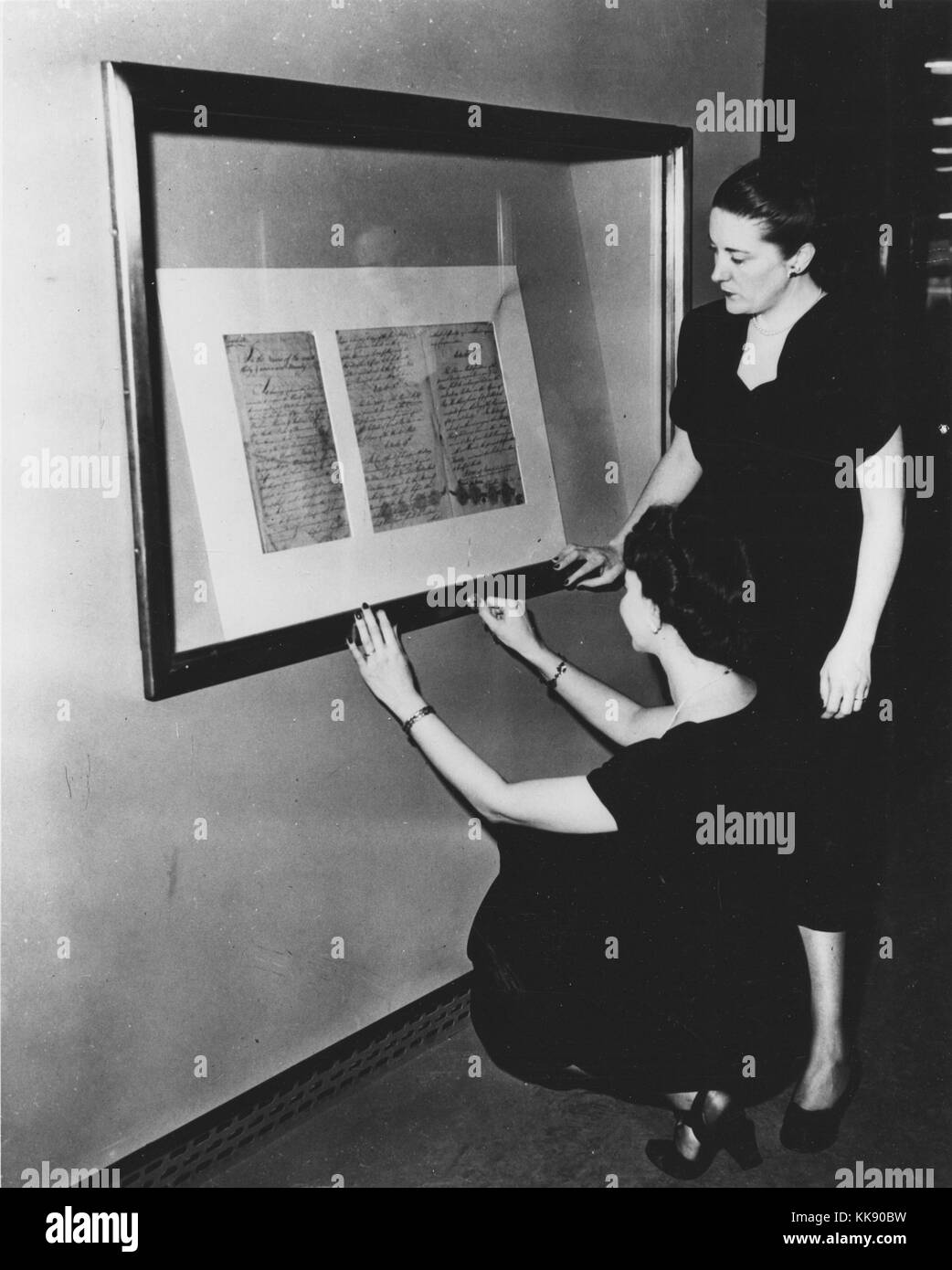 Photograph of National Archives Personnel Working on Installation of Documents on the Freedom Train. Image courtesy National Archives, 1948. Stock Photo