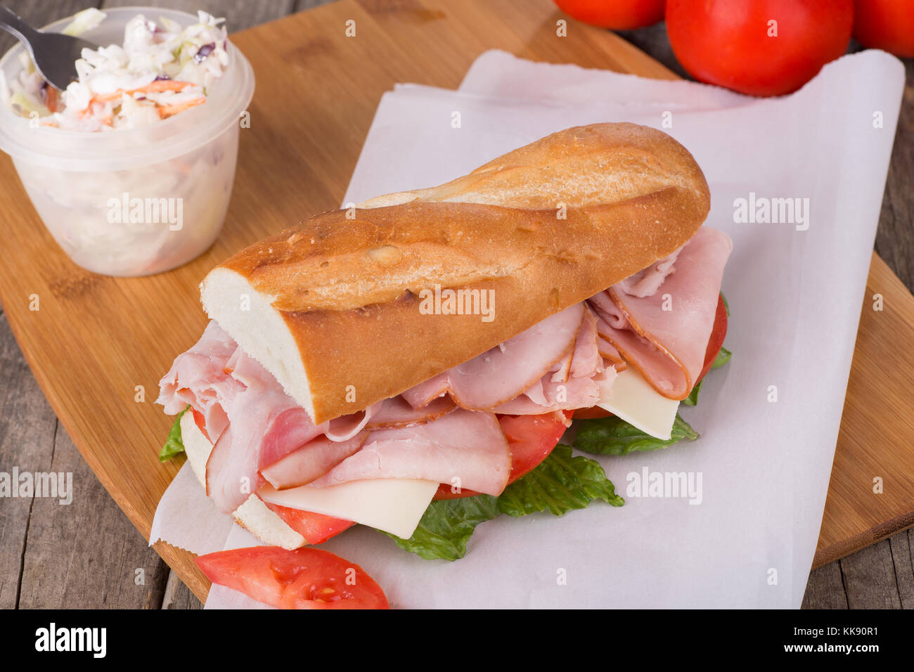 Ham and cheese sandwich with lettuce and tomato Stock Photo