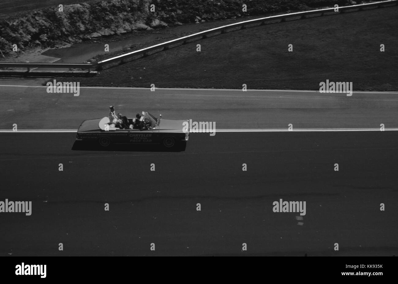 Chrysler 300 pace car being driven by race car driver Sam Hanks during a qualifying lap for the Indianapolis 500 race at Indianapolis Motor Speedway, Indianapolis, Indiana, May 30, 1963. Stock Photo