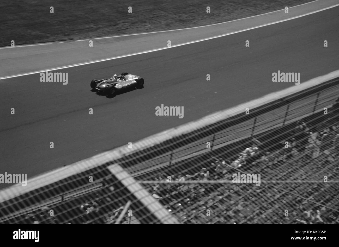 Race car driver Masten Gregory driving car 82, made by MT Harvey, during a qualifying lap for the Indianapolis 500 race at Indianapolis Motor Speedway, Indianapolis, Indiana, May 30, 1963. Stock Photo