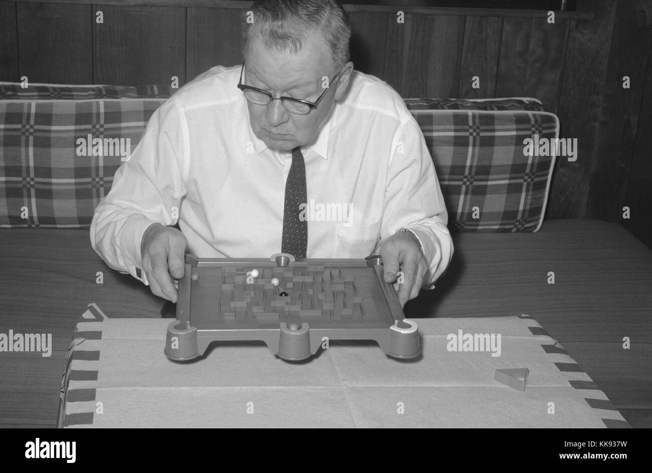 Vernacular snapshot image of grandfather playing, 1963. Stock Photo