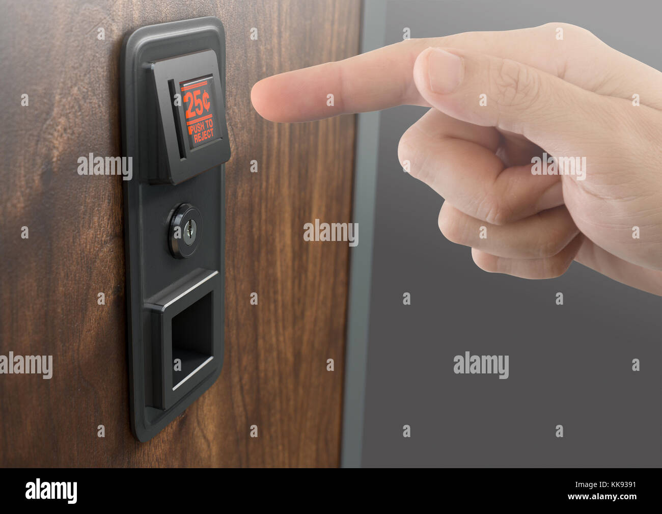 A male finger ready to push the button of a coin receptacle slot panel from a coin operated