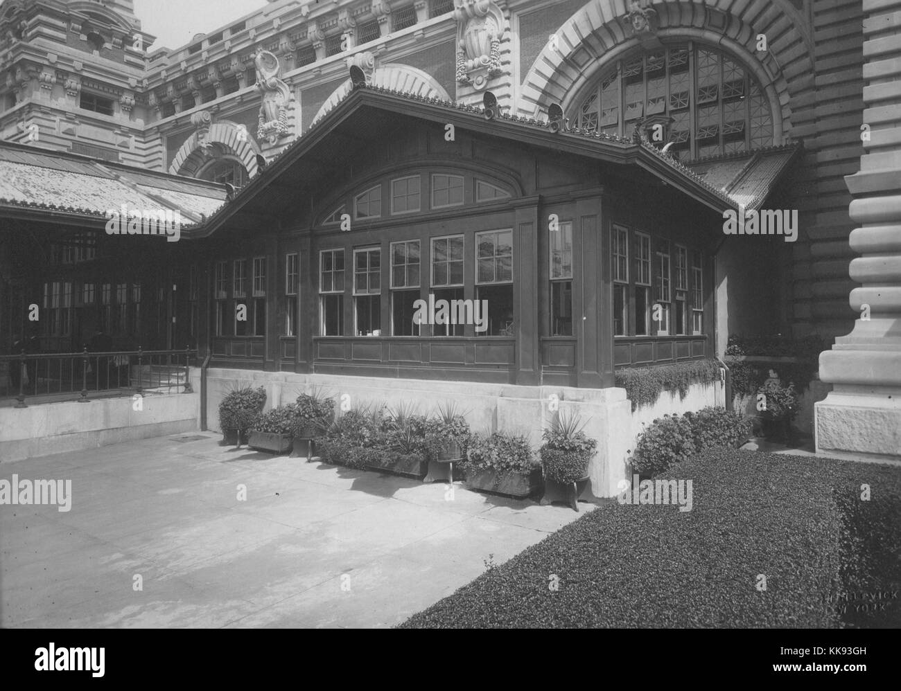 Black and white photograph showing detail from the front entrance of the United States Immigration Station at Ellis Island, by Edwin Levick, Ellis Island, New York, 1907. From the New York Public Library. Stock Photo