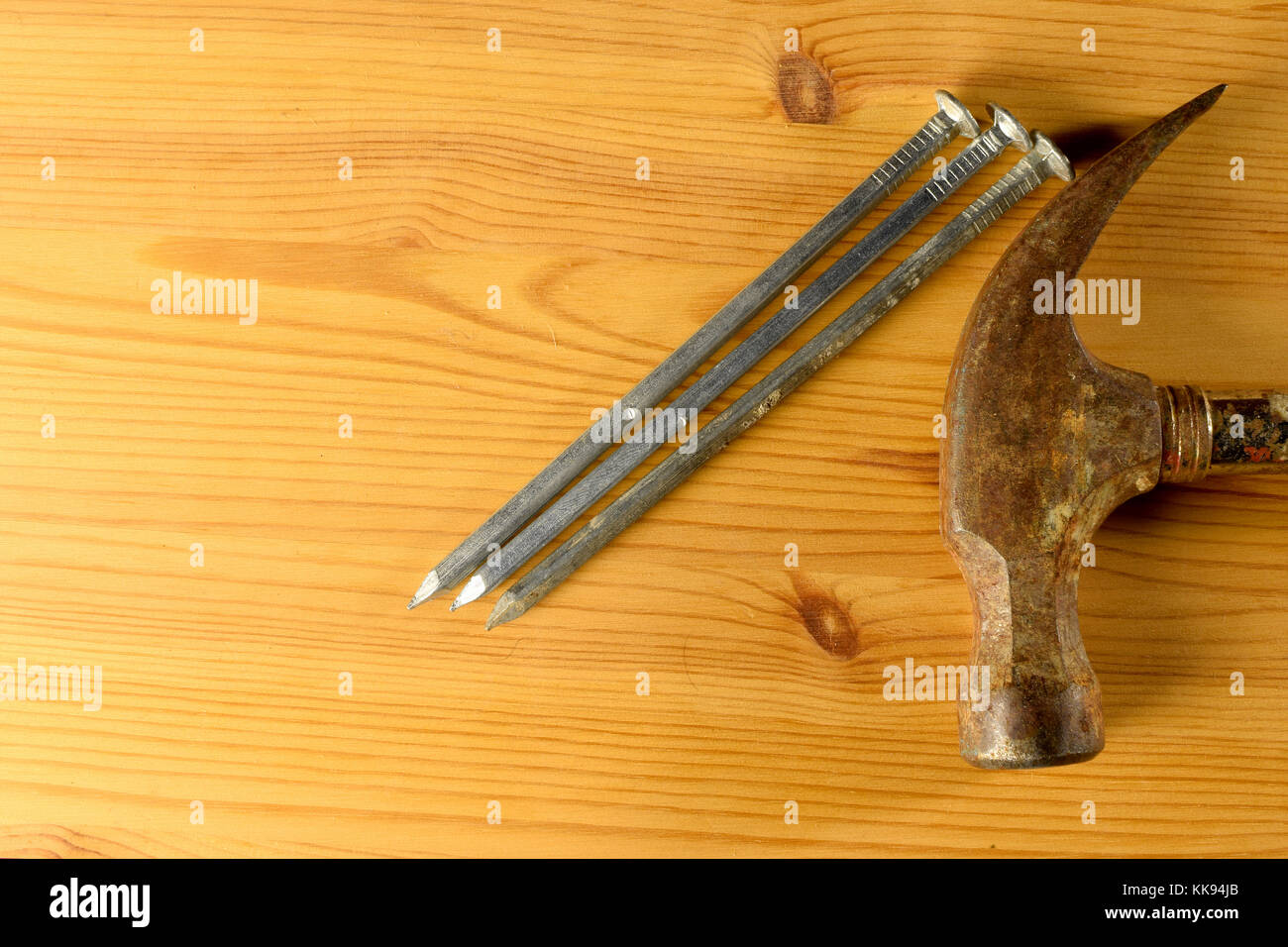 Hammer and nails top view with copy space. Stock Photo