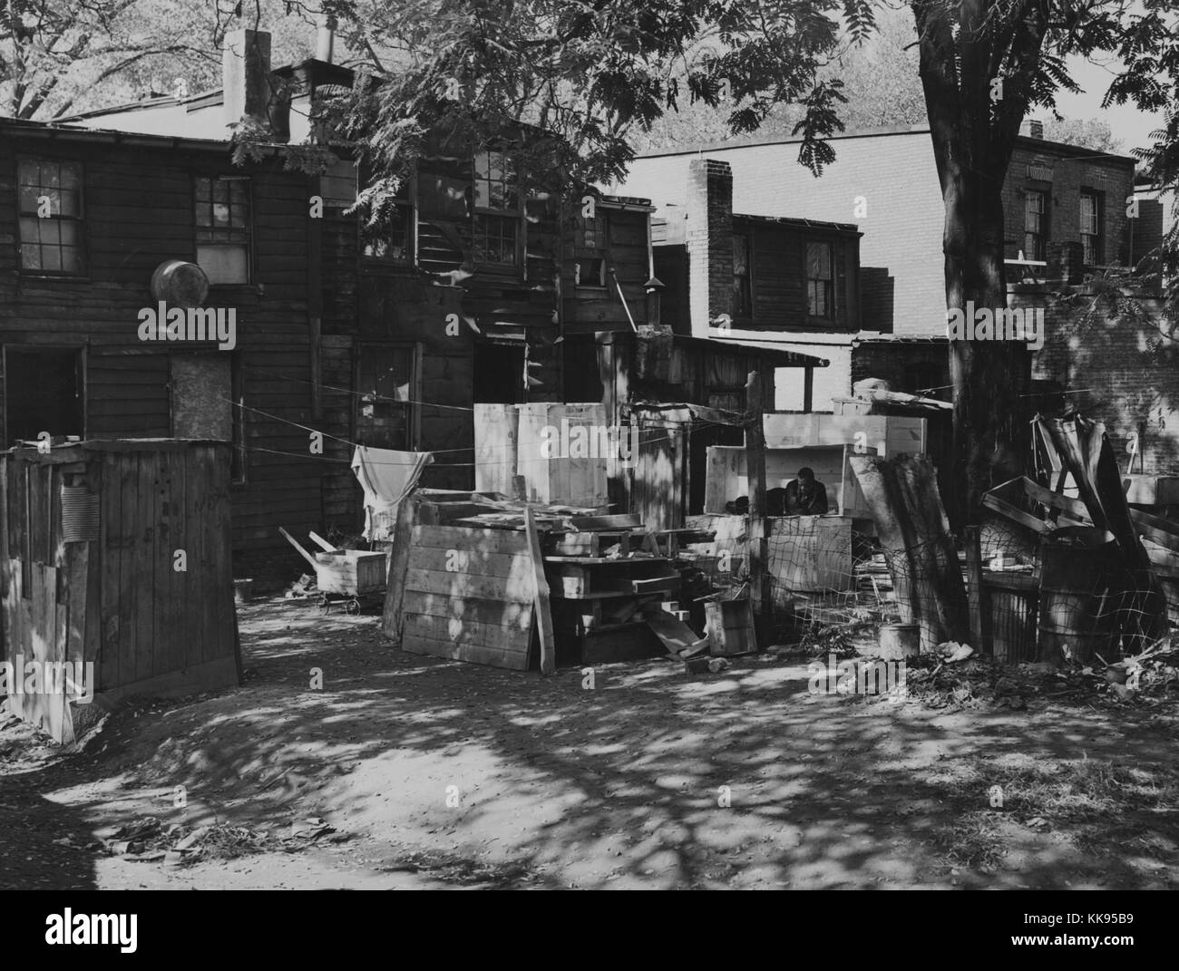 Black and white photograph of an African-American slum area between D and C Streets off 1st Street, SW, Washington, DC, 1877. From the New York Public Library. Stock Photo
