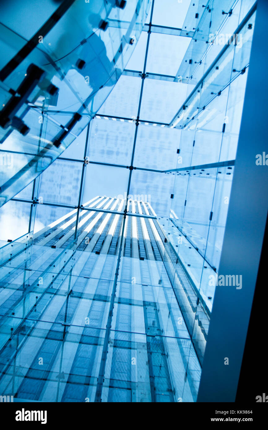 Glass Building Seeing In Modern glass building seen through glass ceiling Stock Photo - Alamy