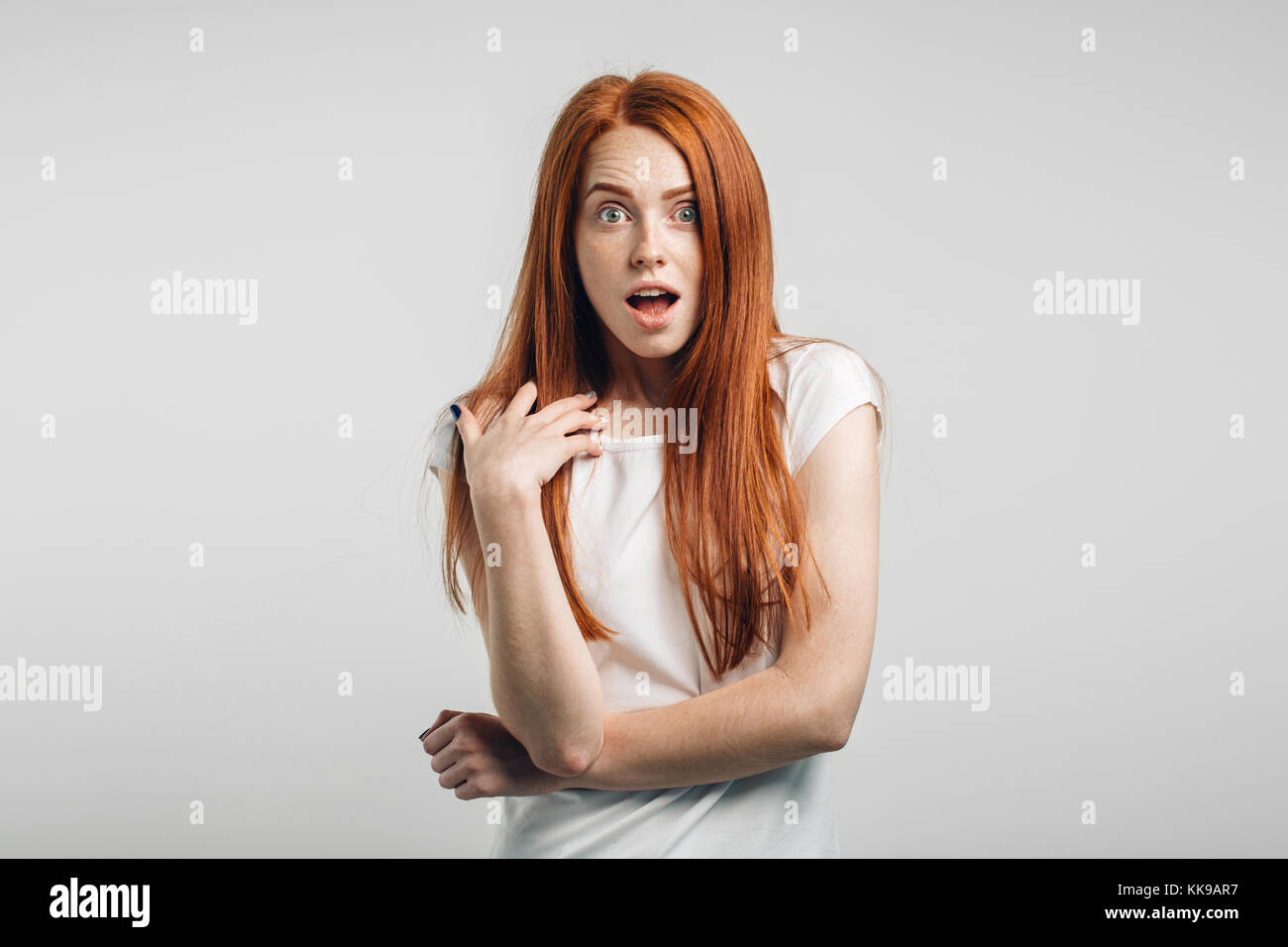 Young redhead freckled mom