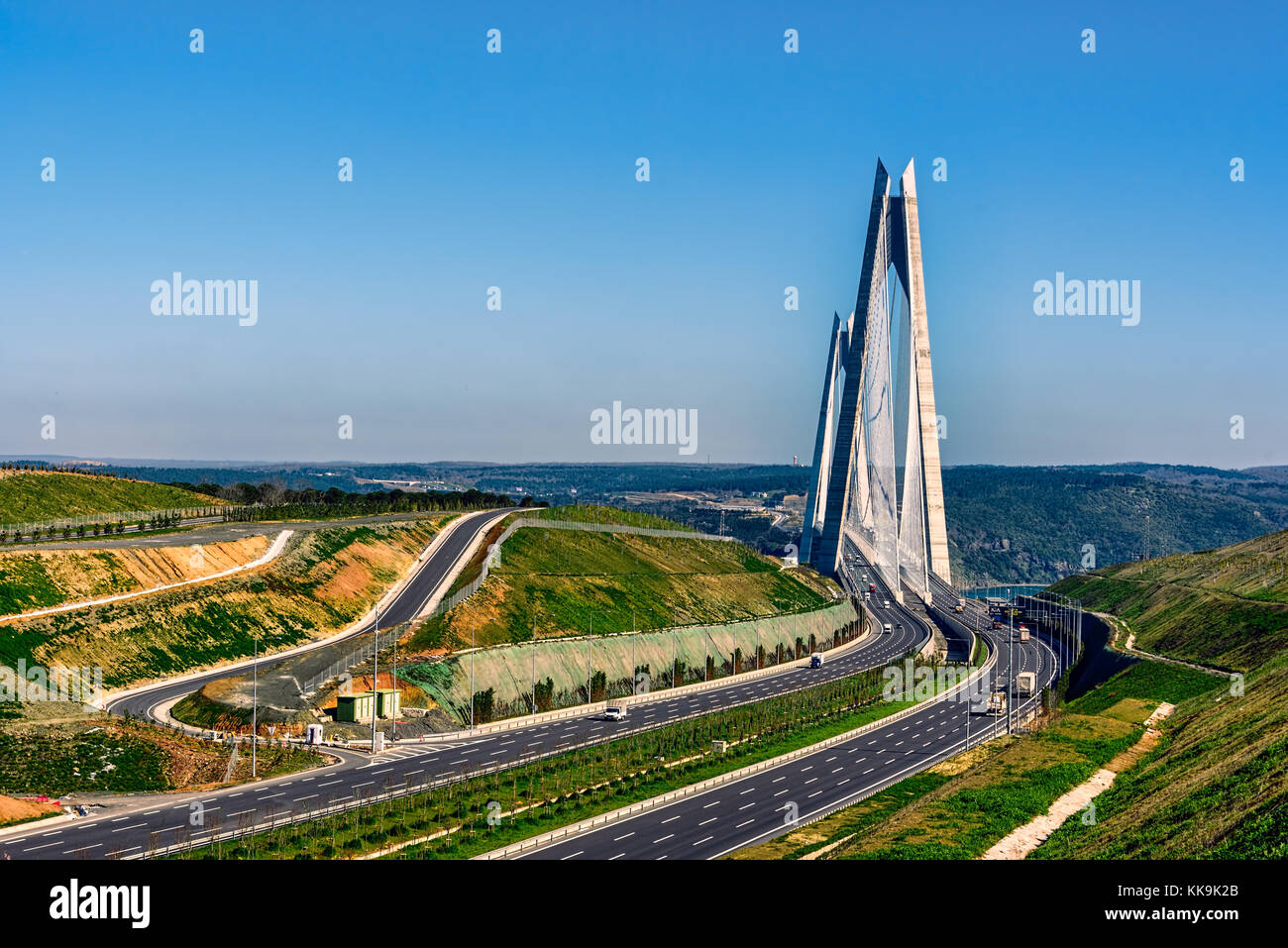 Yavuz Sultan Selim Bridge connecting Europe to Asia as seen from European side under clear blue skies. Stock Photo