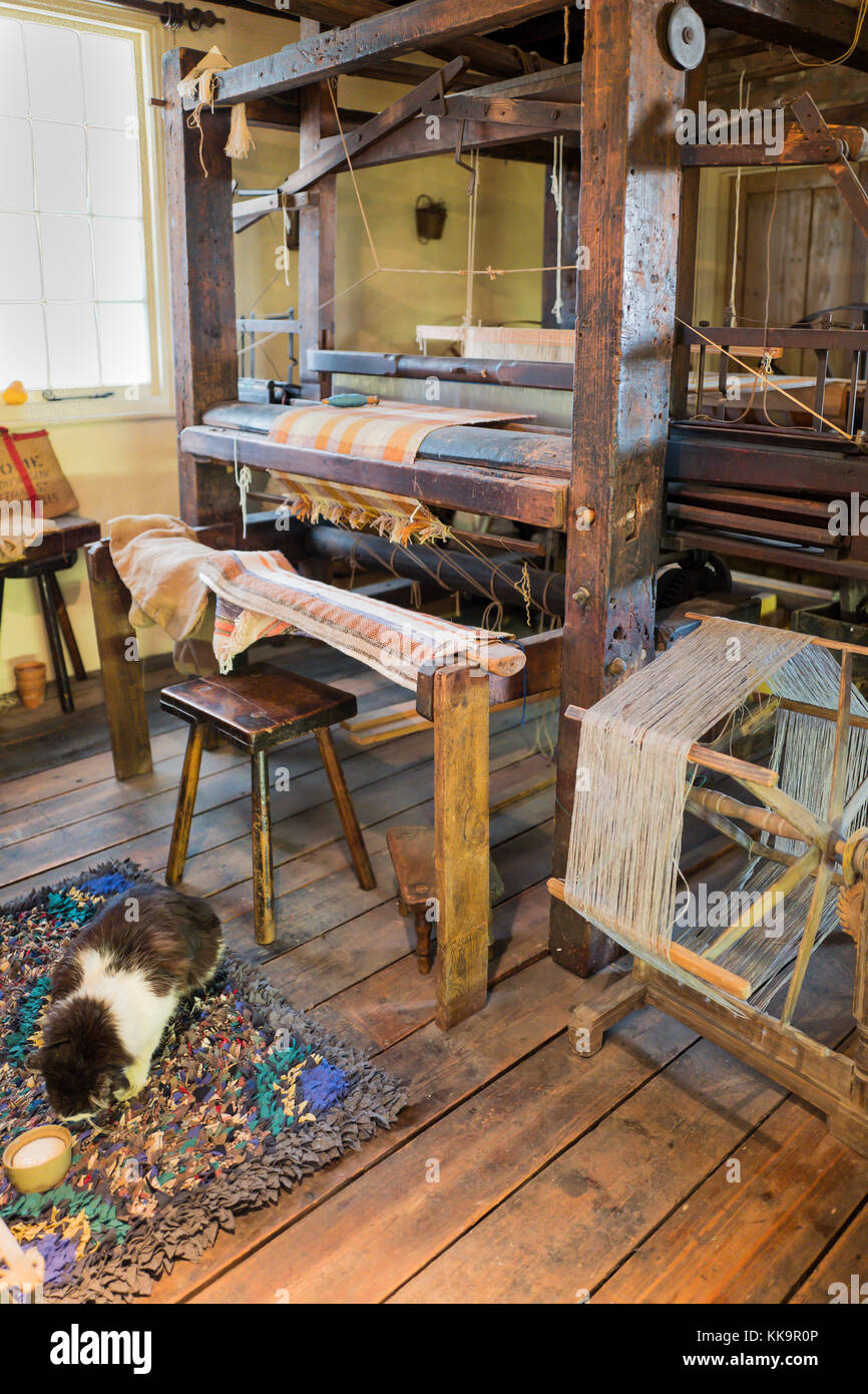 An important exhibit in Trowbridge museum showing a Cottage weaving loom one of many which supplied the woolen mills of England Stock Photo