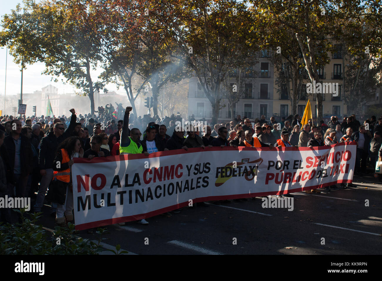 Madrid, Spain. 29th Nov, 2017. A pancart that protest against the multinationals of the personal transport. Tens of thousands march against private Taxis. Credit: Jorge Gonzalez/Pacific Press/Alamy Live News Stock Photo