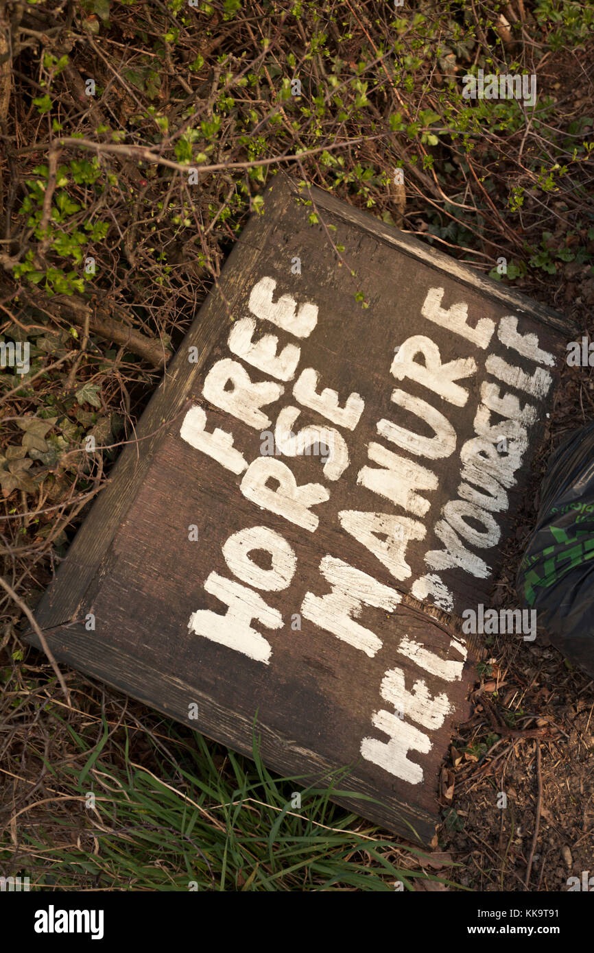 Free Horse Manure Help Yourself sign. Stock Photo