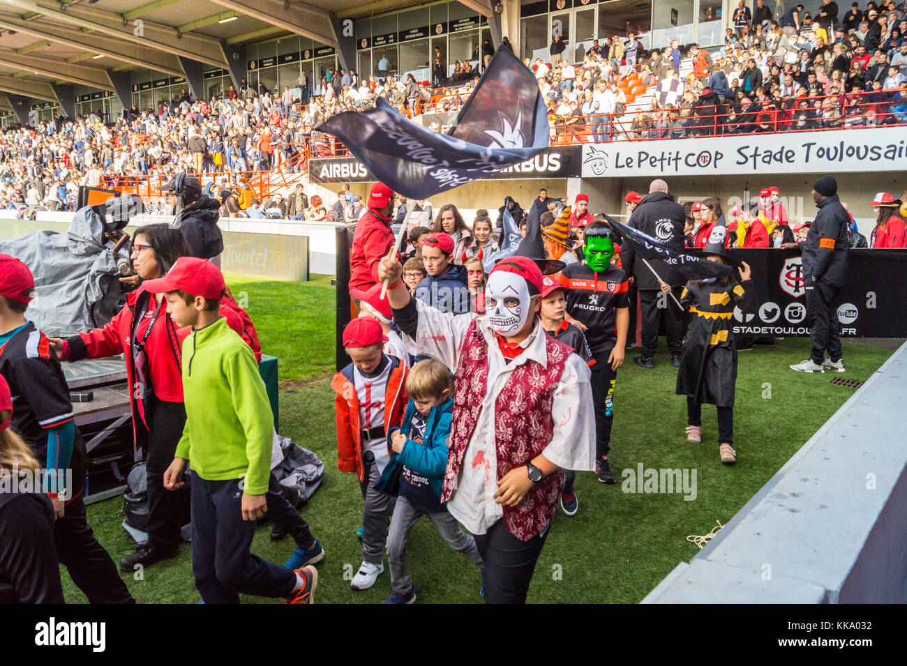 Junior supporters at Ernest Wallon stadium, home ground of Stade Toulousain rugby union team, Toulouse, Haute-Garonne, Occitanie, France Stock Photo
