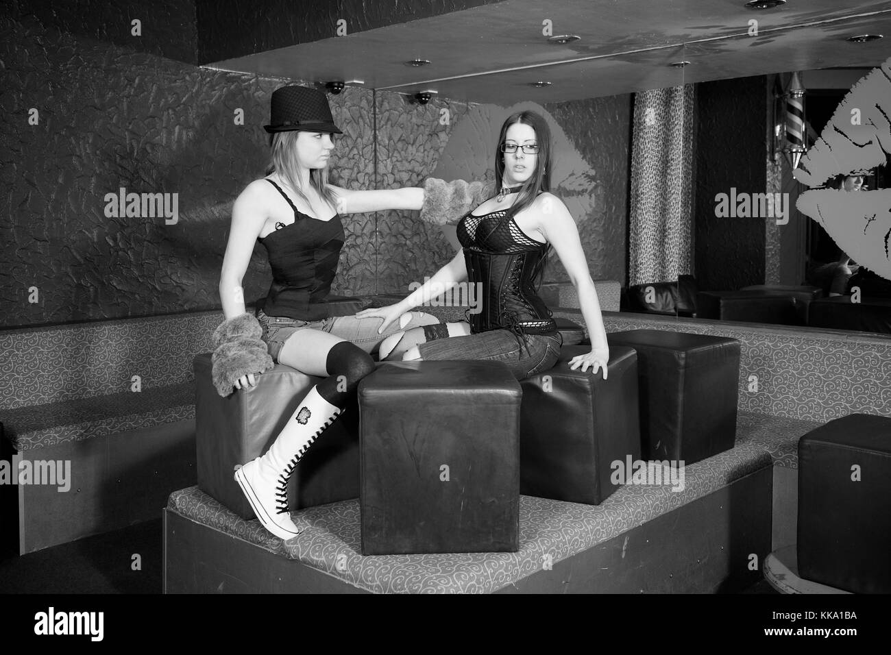 Girls In Alternative Fashion Inside A Night Club Location Stock Photo girls-in-alternative-fashion-inside-a-night-club-location-stock-photo