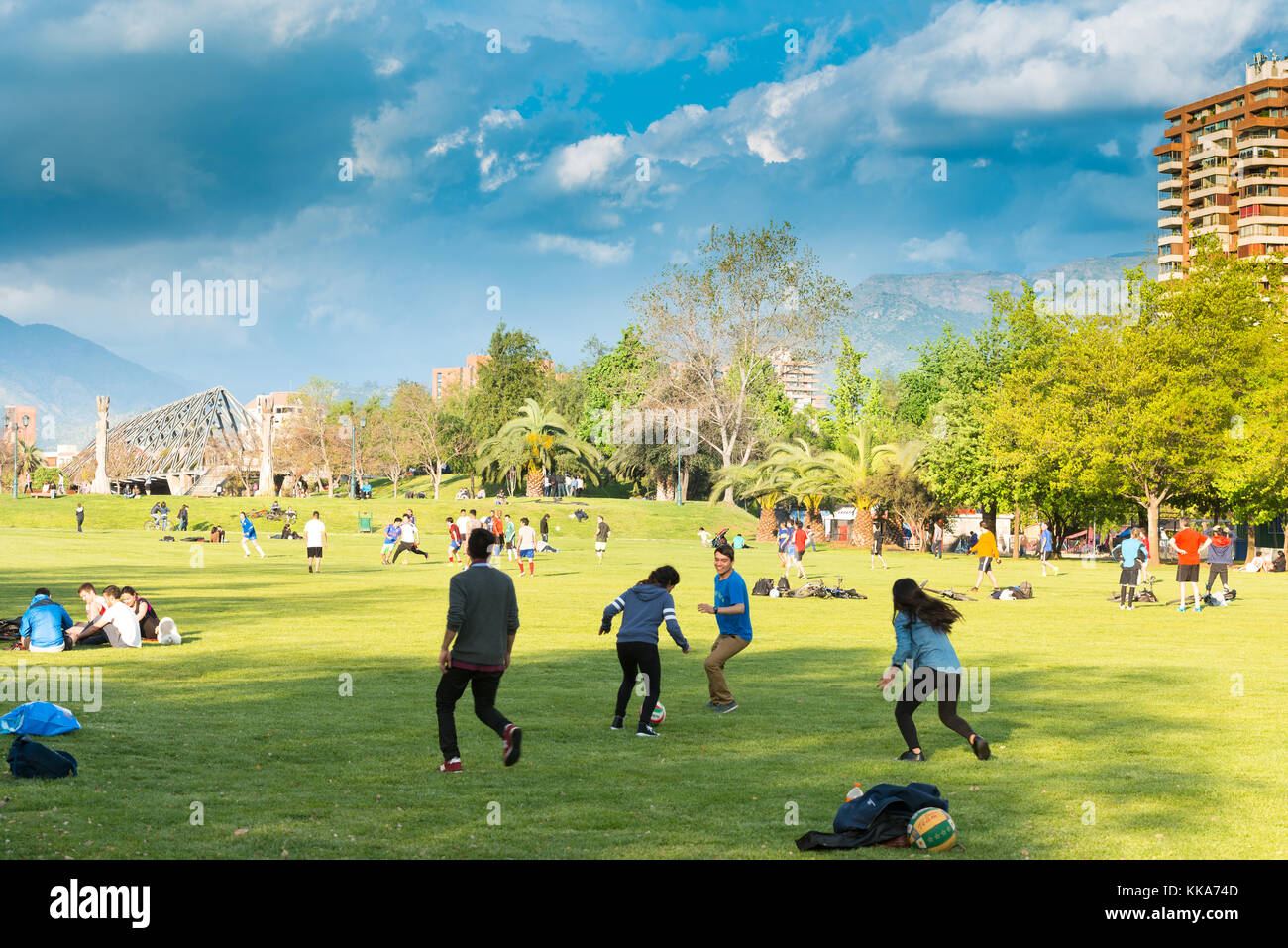 Santiago, Region Metropolitana, Chile - People gather and practice sports on the weekend at Parque Araucano, the mayor urban park in Stock Photo