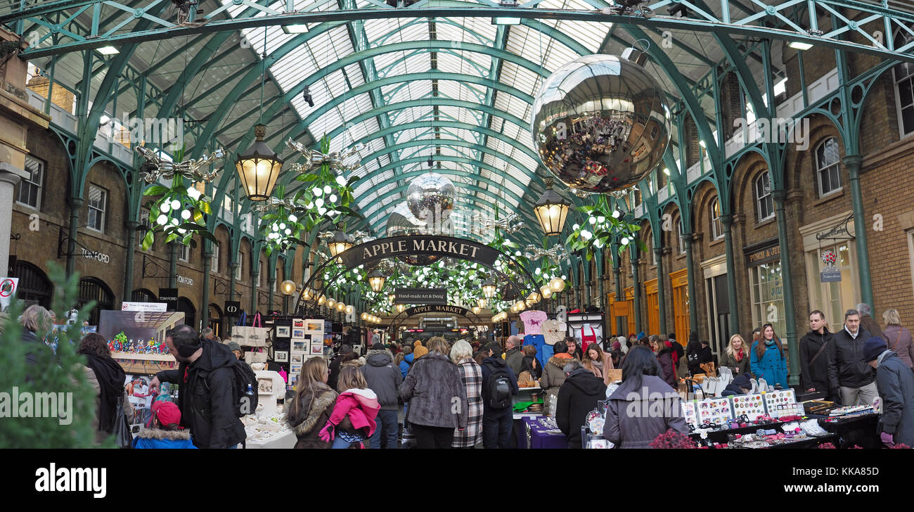 View of the Apple Market in Covent Garden London with Christmas decorations at night Stock Photo