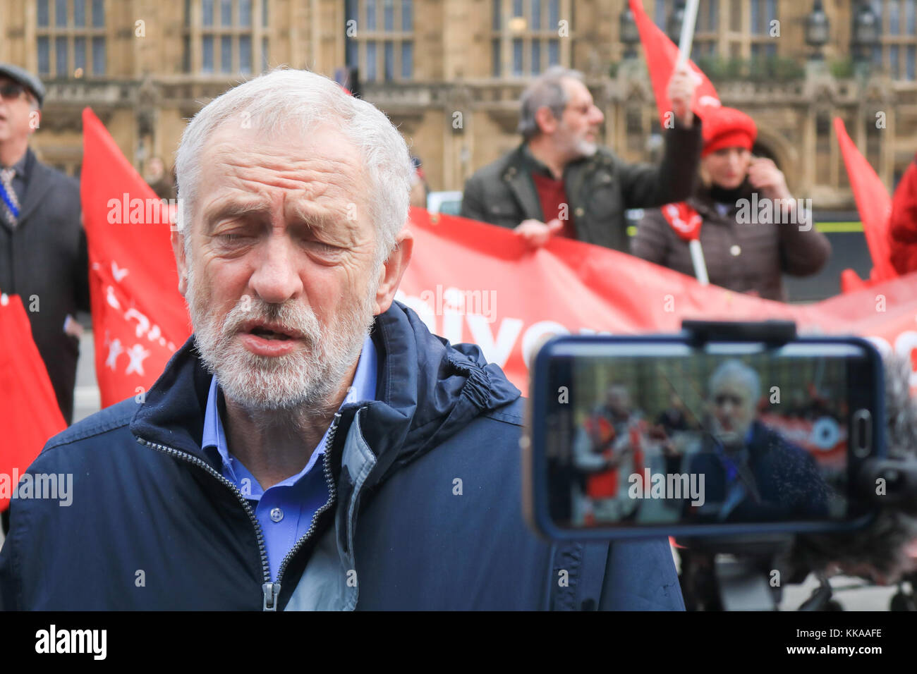 London, UK. 29th Nov, 2017. British Labour party leader Jeremy Corbyn attends a rally organized by Unite Union outside Parliament against universal credit changes introduced by the government which will replace other benefits with a single mostly payment. Universal Credit was introduced in 2013 to replace six means-tested benefits and tax credits: income based Jobseeker's Allowance, Housing Benefit, Working Tax Credit, Child Tax Credit, income based Employment and Support Allowance and Income Support Credit: amer ghazzal/Alamy Live News Stock Photo