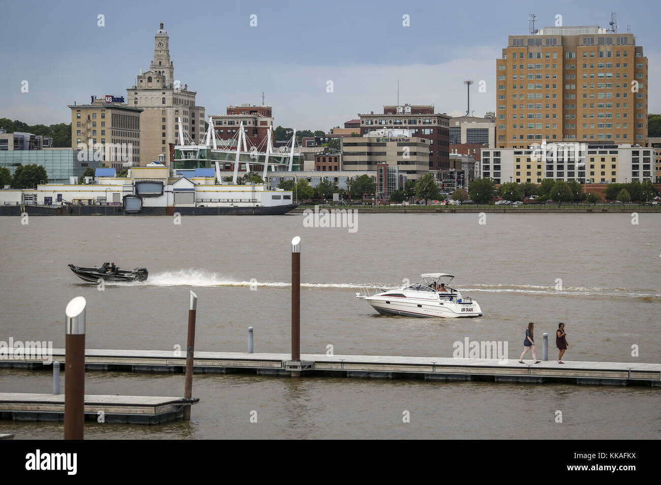 Rock Island, Iowa, USA. 2nd July, 2017. Boats and pedestrians are seen along the Mississippi River with Davenport in the background from Schwiebert Park in Rock Island, Illinois, on Sunday, July 2, 2017. Credit: Andy Abeyta, Quad-City Times/Quad-City Times/ZUMA Wire/Alamy Live News Stock Photo