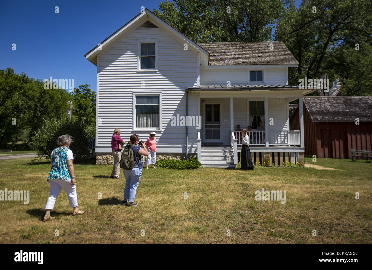 Cassville, Iowa, USA. 15th June, 2017. A group prepares for a tour of a residence set up to look true to the lifestyle of a farmer of the era in Cassville, Wisconsin, on Thursday, June 15, 2017. Stonefield Village is host to a display of 1800s agricultural machinery as well as a replica farming community from the mid 1800s which is located on the estate of Wisconsin's first Governor, Nelson Dewey. Credit: Andy Abeyta, Quad-City Times/Quad-City Times/ZUMA Wire/Alamy Live News Stock Photo