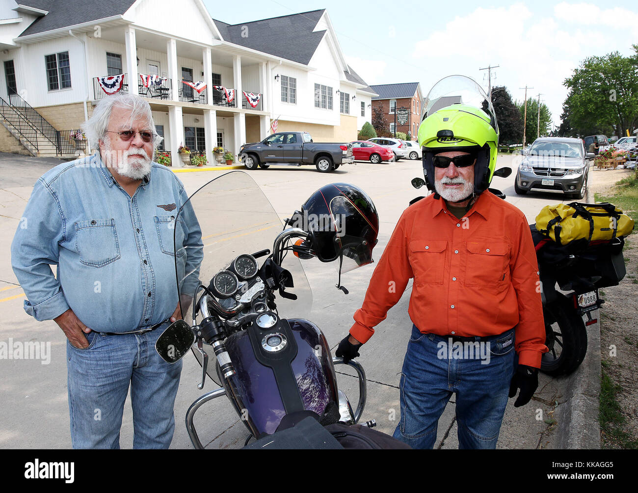 Iowa, USA. 13th June, 2017. Thad Knight, left of New Mexico and Kelly Clark of Texas prepare to continue on their journey to cross every operational ferry on the Mississippi River after stopping at Breitbach's Country Dining in Balltown, Iowa Tuesday June 13, 2017. The pair was told about the Iowa eating establishment after crossing the river on the Cassville Car Ferry which connects the Great River Road and the Iowa Great River Road. The ferry served the early settlement as far back as 1833 and continues today. It is the oldest operating ferry service in the state of Wisconsin. (Credit Image Stock Photo