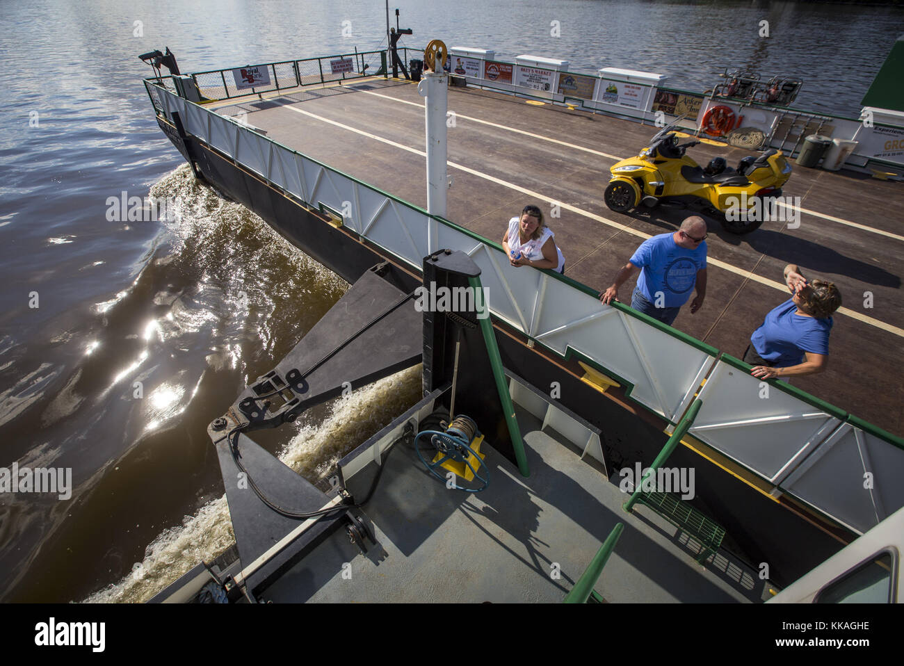Cassville, Iowa, USA. 15th June, 2017. Guests are seen talking with Deckhand Lori Nemitz, right, during their ride on the Pride of Cassville Car Ferry on the Mississippi River on Thursday, June 15, 2017. The ferry is the oldest operating car ferry in Wisconsin, serving the area as early as 1833. It connects the Great River Road and the Iowa Great River Road with a 10-15 minute ride operating from early May to late October. Credit: Andy Abeyta, Quad-City Times/Quad-City Times/ZUMA Wire/Alamy Live News Stock Photo