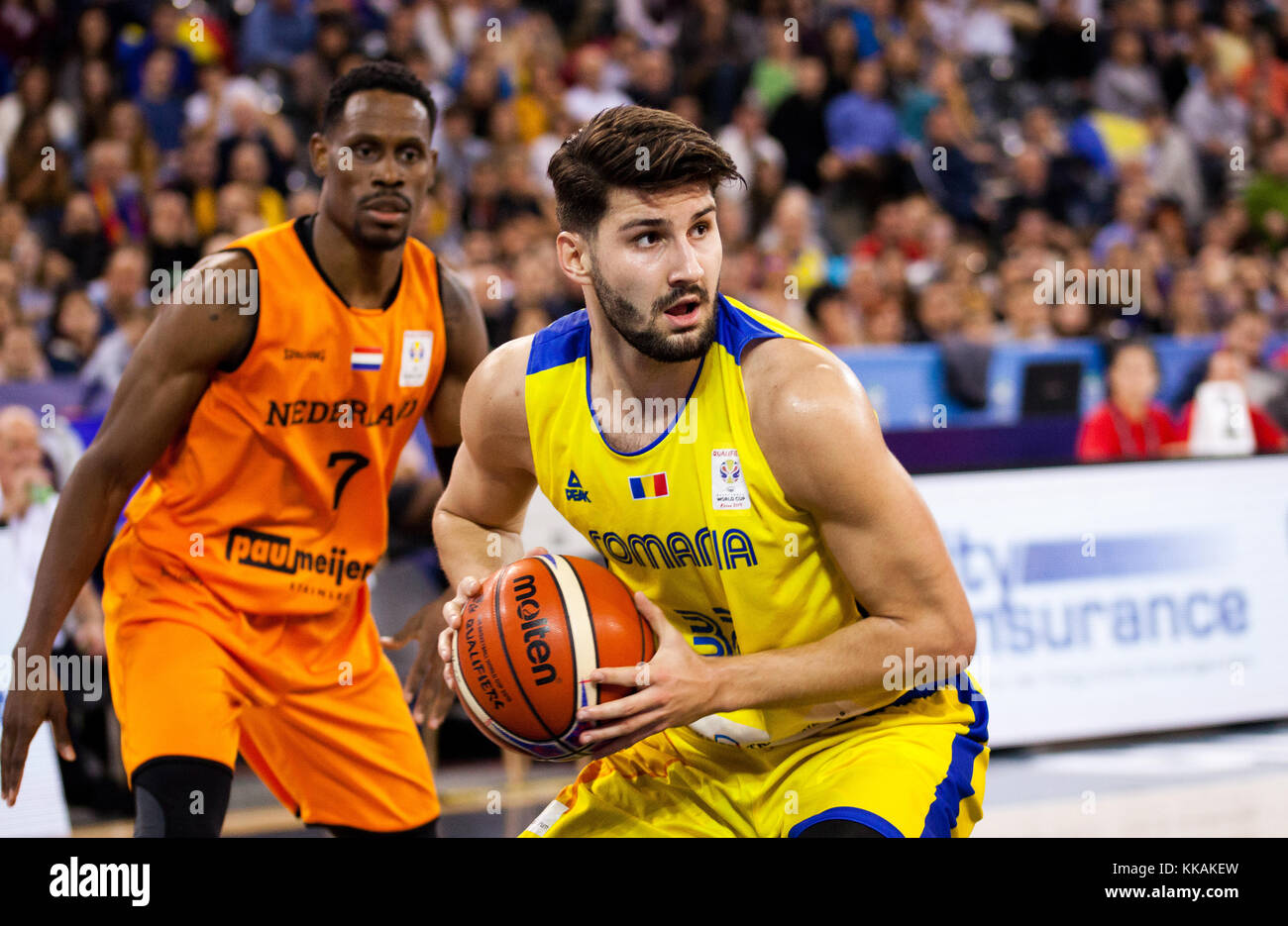 Nandor Kuti (R) of Romania in action during FIBA Basketball World Cup 2019  qualifier game between Romania and Netherlands, Cluj-Napoca, 26 November  2017. Photo: Cronos/Melinda Nagy Stock Photo - Alamy