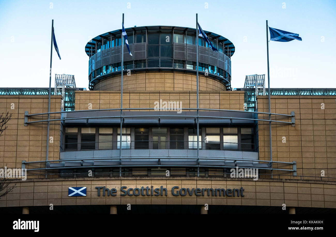 Leith, Edinburgh, Scotland, United Kingdom, 30th November 2017. St. Andrew's Cross saltire flags flying on top of the Scottish Government building at Victoria Quay in Edinburgh on St Andrew's Day Stock Photo