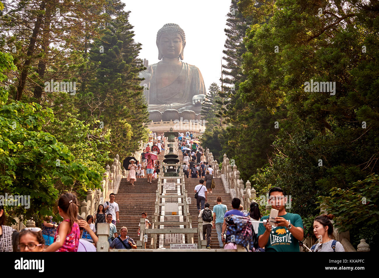Visitors make the climb to see Big Buddha, Po Lin Monastery, Ngong Ping, Lantau Island, Hong Kong, China, Asia Stock Photo