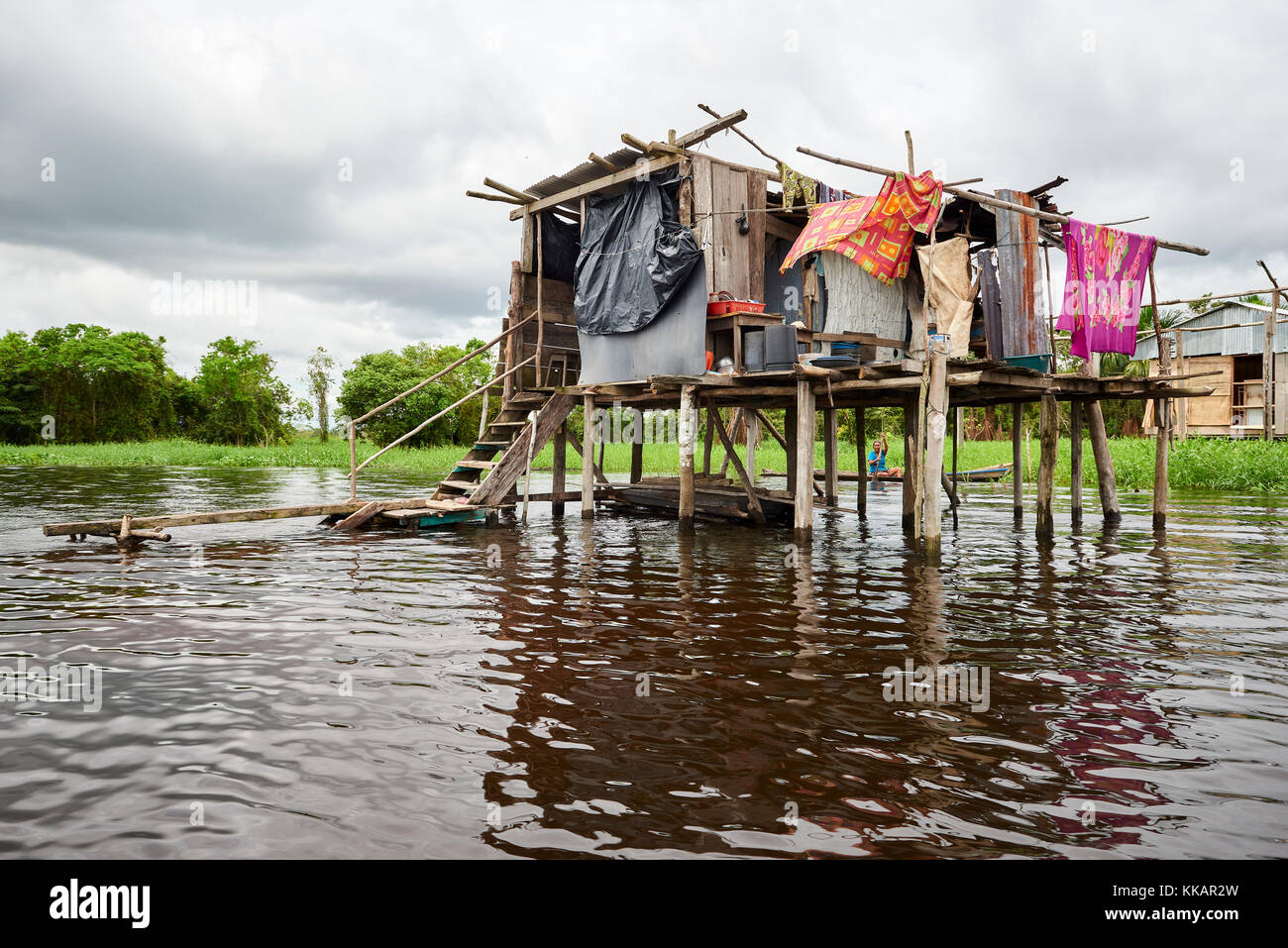 Wooden house on stilts in a flooded area of Iquitos, Peru, South ...