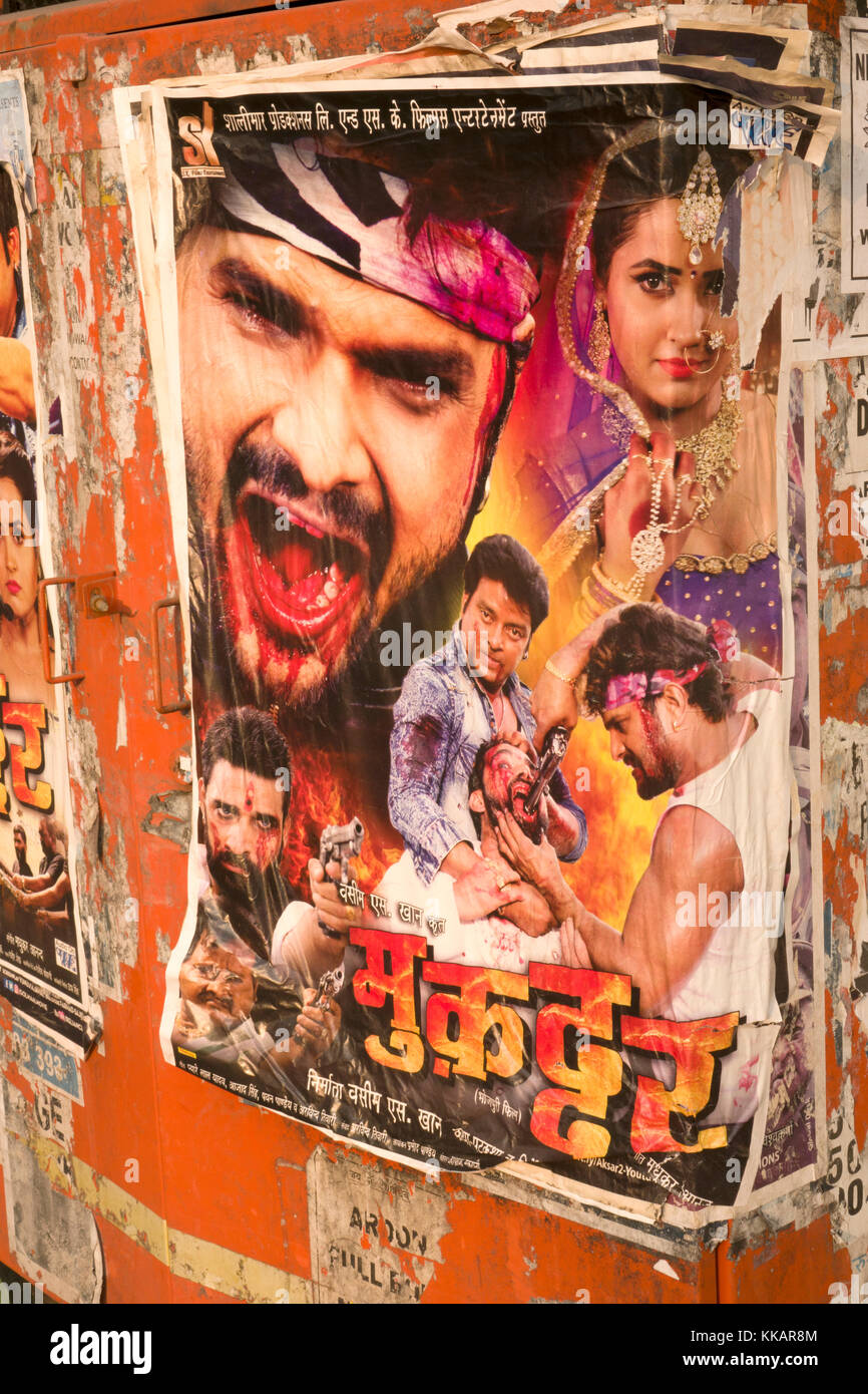 Bollywood movie poster posted in public place advertising latest film Stock Photo
