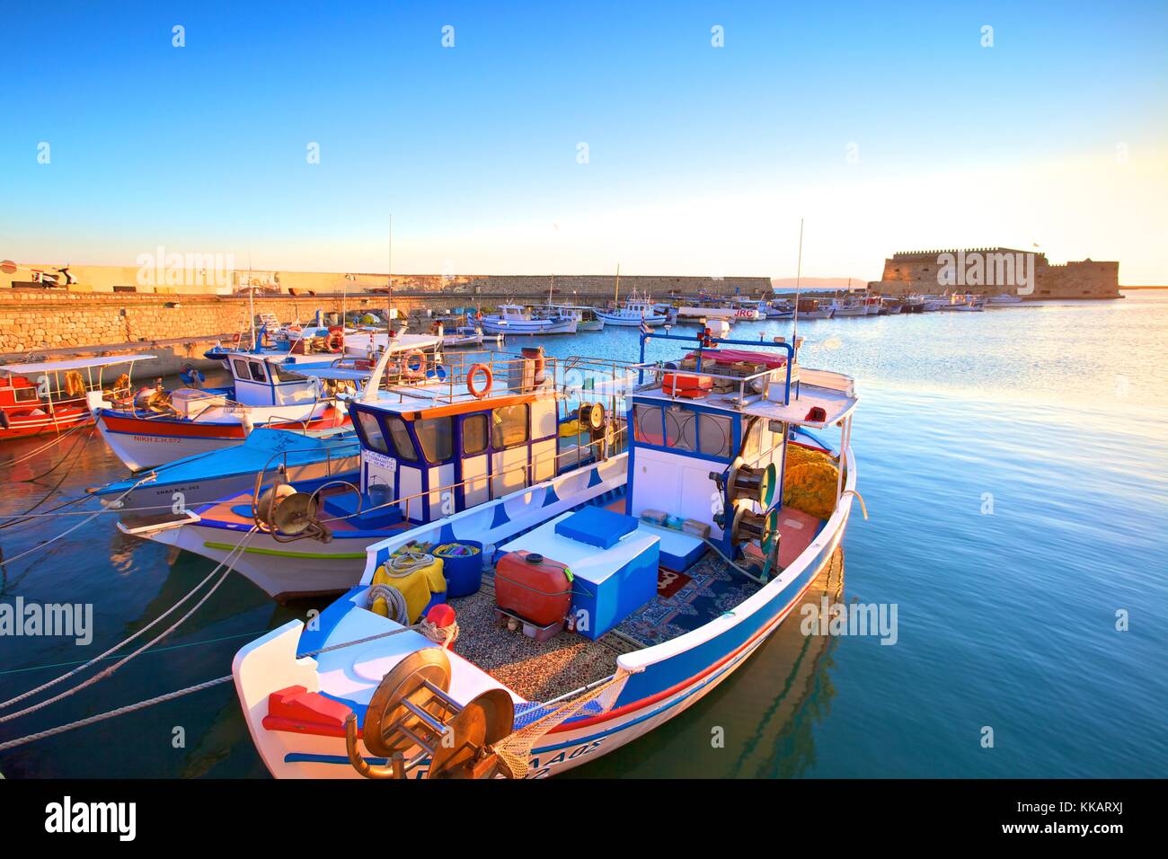 The boat lined Venetian Harbour and Fortress, Heraklion, Crete, Greek Islands, Greece, Europe Stock Photo