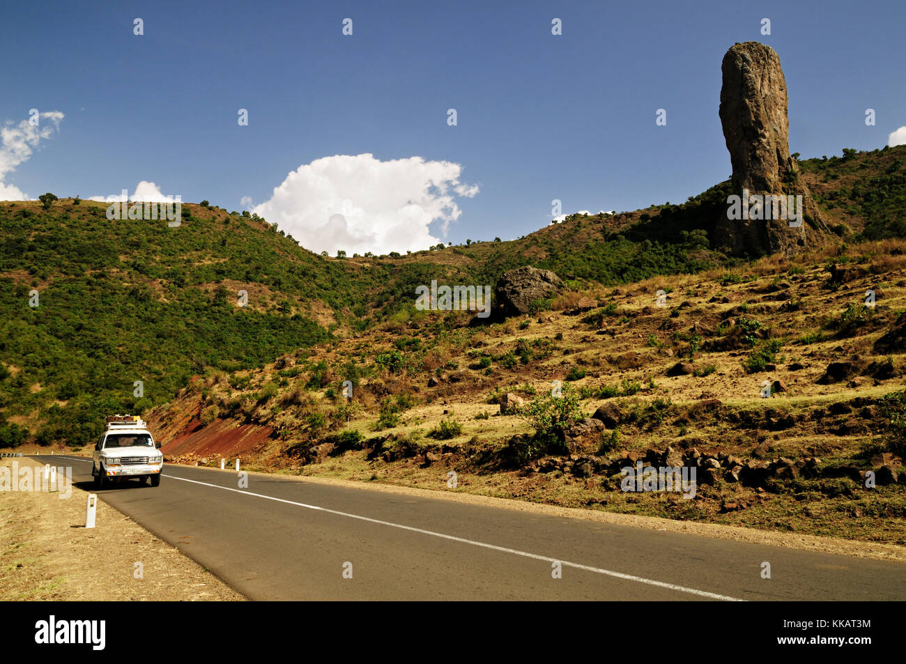 Rocky outcrop (God's finger) and car between Gondar and Bahir Dar, Amhara Region, Ethiopia Stock Photo