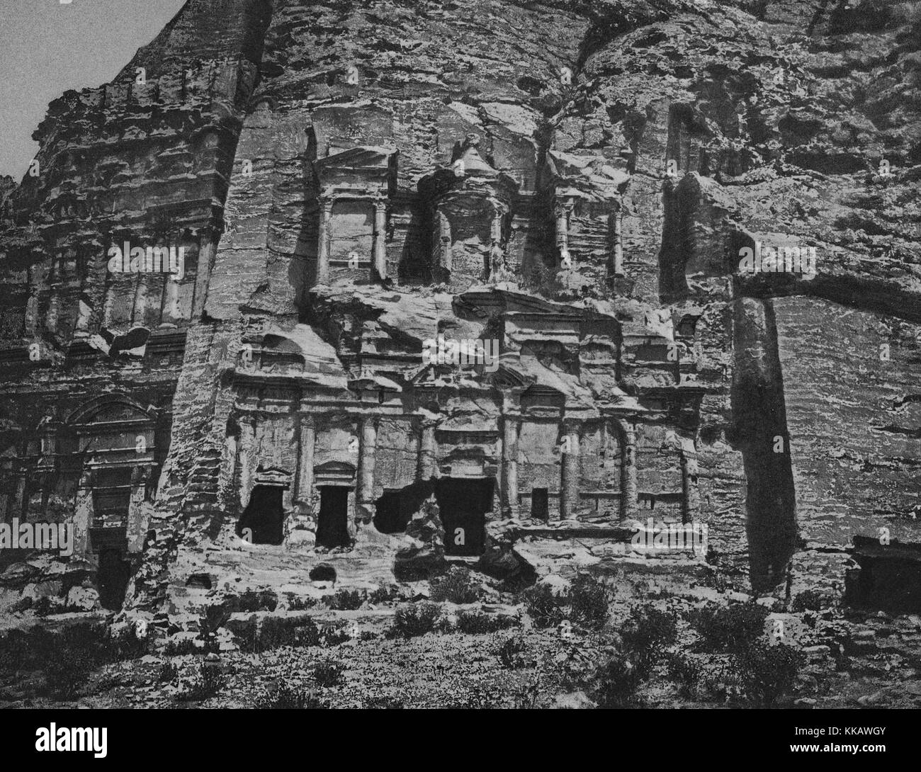 The rock-cut architecture in the ancient city of Petra, this section part of a series of tombs in the southern part of the city, Jordan, 1874. From the New York Public Library. Stock Photo