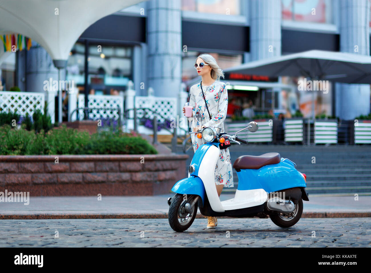 Girl on moped hires stock photography and images Alamy