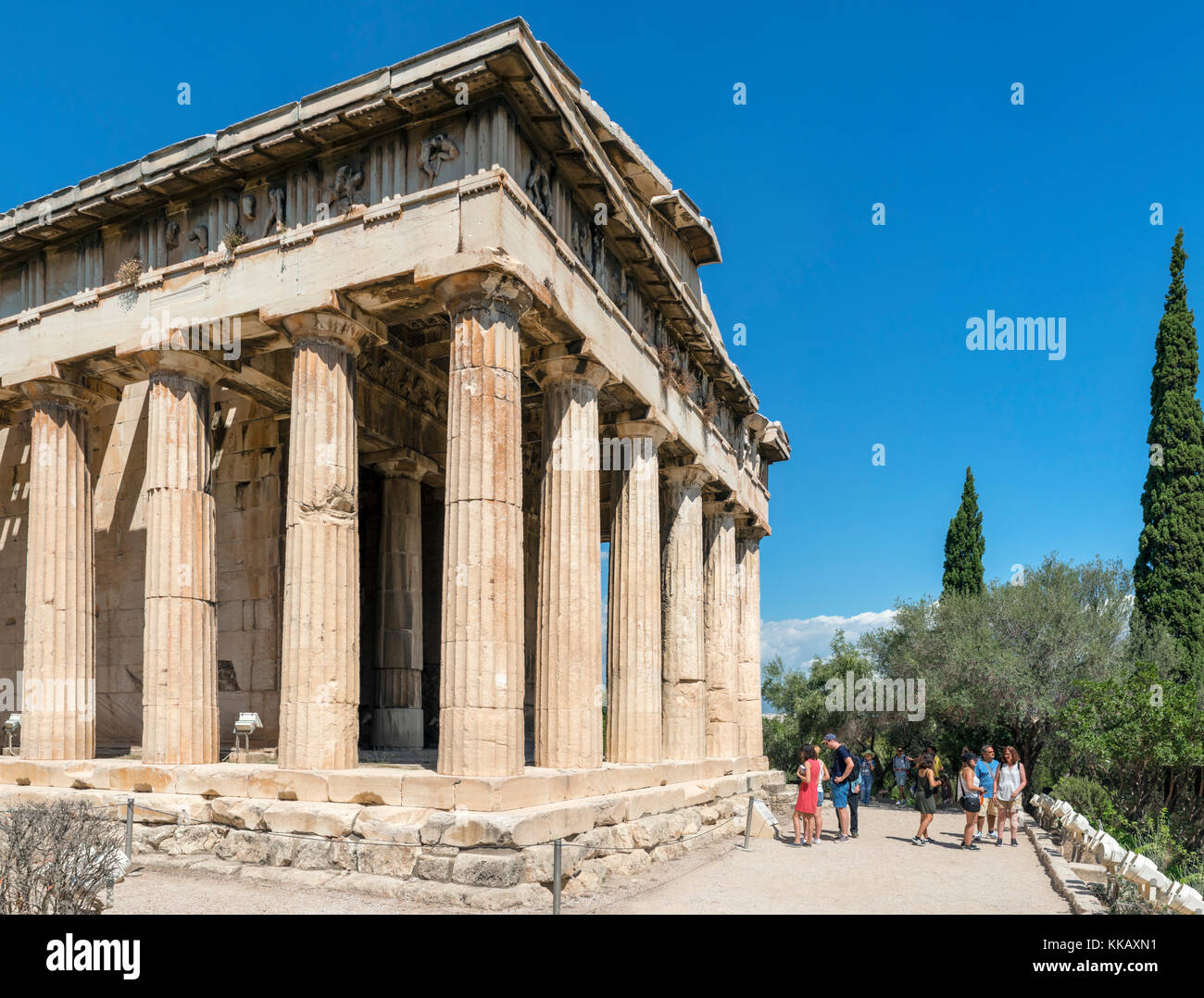 Tourists in front of the Temple of Hephaestus (Hephaistos) in the precinct of the Ancient Agora, Athens, Greece Stock Photo