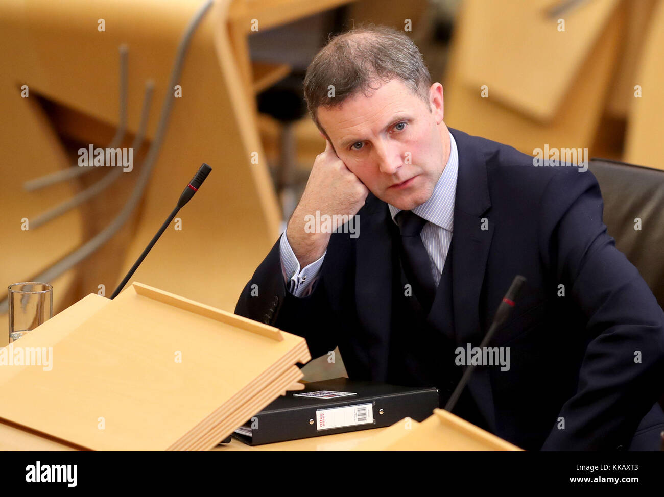 Justice Secretary Michael Matheson makes a statement in the main chamber of the Scottish Parliament, Edinburgh, after it emerged that Police Scotland has suspended four officers, including an assistant chief constables. Stock Photo
